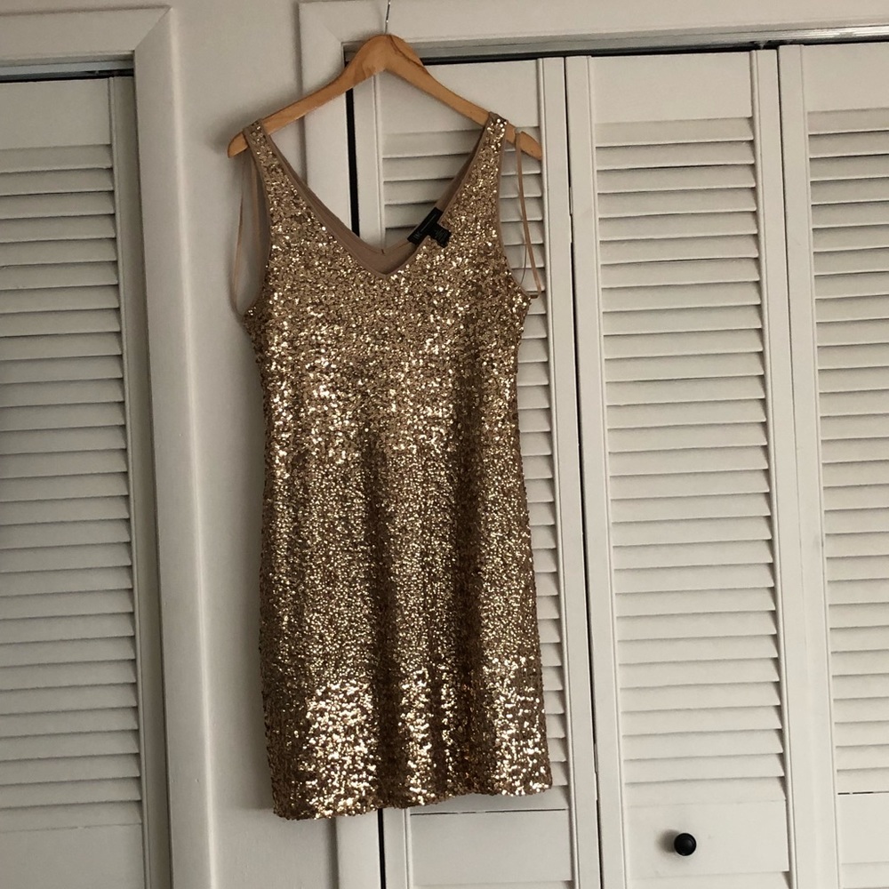 SPARKLE AT YOUR HOLIDAY PARTIES IN THIS!